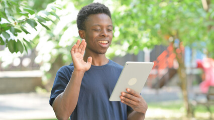 Casual African Man Making a Video Call on a Tablet