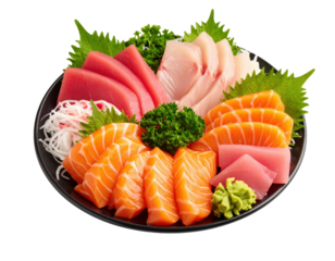 Fresh sashimi platter with salmon, tuna and white fish slices garnished with wasabi and greens
