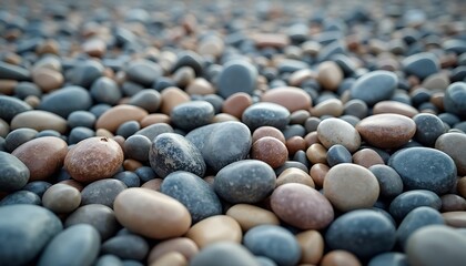 Close-up of multicolored smooth pebbles and stones covering the ground surface