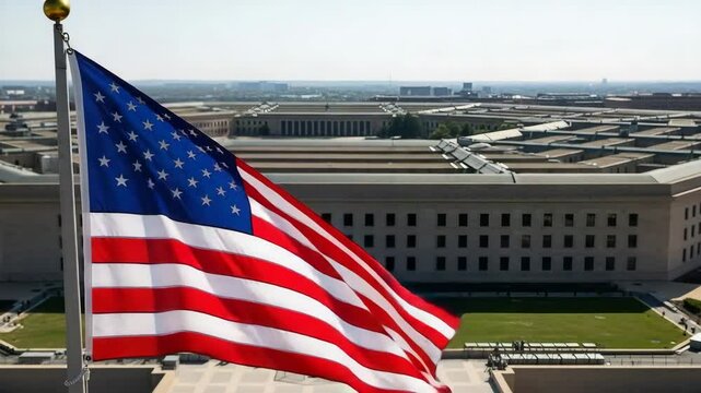 The American Flag flies proudly in front of a large building.