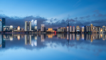 Naklejka premium Modern City Skyline at Dawn