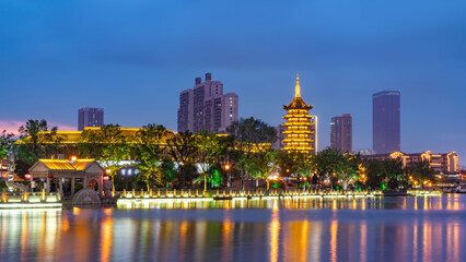 Evening Cityscape with Pagoda and Modern Architecture