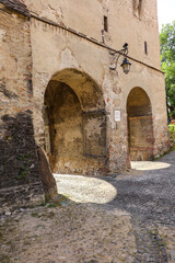 Fototapeta premium Traditional Medieval Houses and Streets in Sighisoara, Romania – Historic Architecture and Cultural Heritage 
