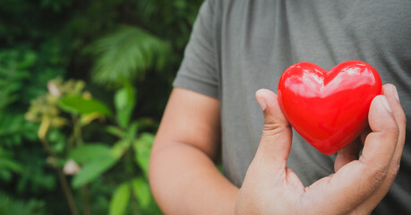 Hand holding red heart, World health day, Health care and mental health concept, Health insurance, Charity volunteer donation, CSR responsibility, World heart day, Self love