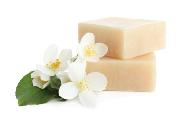 Soap bars and jasmine flowers isolated on white