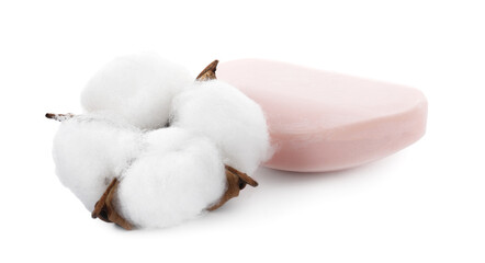 Soap bar and cotton flower isolated on white