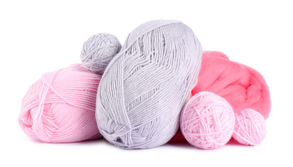 Felting wool and knitting yarn isolated on white