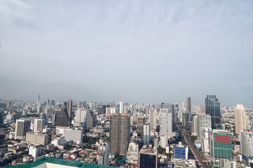 Aerial View of Urban Cityscape with Modern Skyscrapers Under a Clear Sky