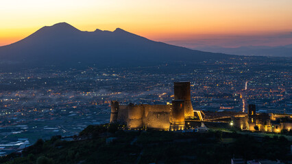 Lettere Castle seen from afar with Vesuvius and the city of Naples in the background. Italy