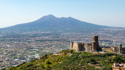 Lettere Castle seen from afar with Vesuvius and the city of Naples in the background. Italy