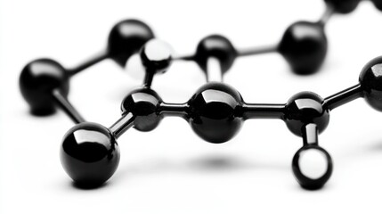 Molecular Model Close-Up: Black Spheres, White Highlight, Scientific Structure
