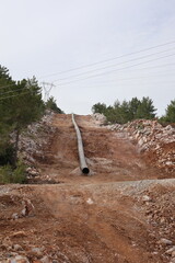 mountain construction drone view coniferous forest 4k. construction of gas pipelines in the...