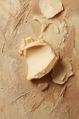 A piece of butter is on a table
