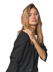 Naklejka premium Young businesswoman in a suit having a shoulder pain.