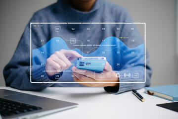 Closeup of smartphone user planning with a futuristic dashboard UI, featuring data visualization, calendar interface, and real people