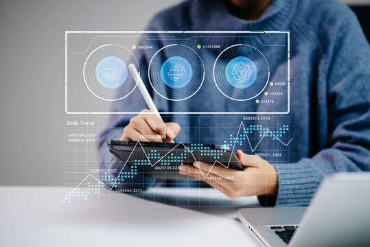 Hands on data analytics with digital tablet and stylus. Smart UI, graphs, and data trends in futuristic style. - Powered by Adobe