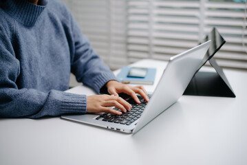 Businesswoman s hands typing on laptop keyboard in morning light computer, typing, online