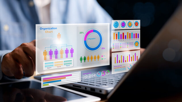 Digital organization chart with team structure, gender distribution pie chart, and colorful data graphs floating over laptop. Concept of business analytics and HR management.