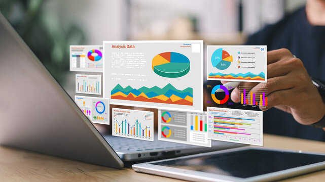 Businessman analyzing digital data dashboards on laptop with floating charts, graphs, and statistics. Concept of data analytics, business intelligence, and KPI tracking.