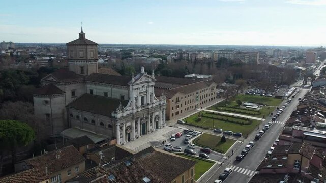 Aerial drone footage of Ravenna, a historic city in Emilia-Romagna, Italy, known for its ancient churches, mosaics, and UNESCO World Heritage Sites under warm light and clear skies.