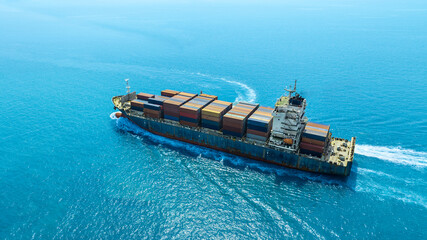 Aerial view of the freight shipping transport system cargo ship container. international...