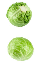 Fototapeta premium Two perfectly ripe green cabbages falling against a transparent background, ideal for food and health related designs