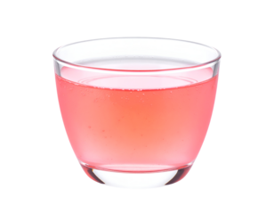 A delightful pink drink with effervescent bubbles fills a sleek glass, ready to quench thirst.