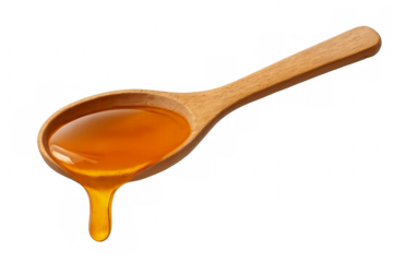 Wooden spoon dripping with golden honey on transparent background