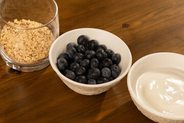 Ingredients for a Healthy Breakfast Blueberries, Yogurt and Nuts