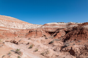 Toadstool Hoodoos Trail, Kane County, Utah geology. Entrada Sandstone with Carmel Formation, upper unit (Middle Jurassic). slope-forming and earthy-weathering. Sedimentary rocks.