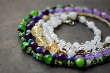 necklace of natural stones on the background of gem stones