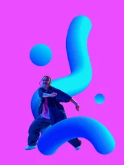 Fotobehang A dancer strikes a dynamic pose surrounded by blue 3D gradient shapes against a vivid pink background. Concept of artistic expression and creativity in dance. Inclusive expression through movement © master1305