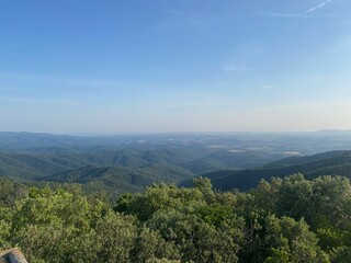 Green landscape with a long view on top of a mountain in Girona, Catalonia