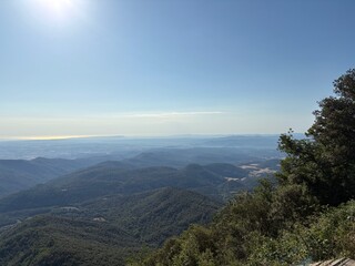 Mountain landscape with long view on the horizon to the Mediterranean Sea in Girona