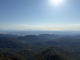 Mountain landscape with long view on the horizon to the Mediterranean Sea in Girona
