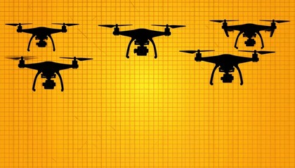 Four Drones with Propellers Flying Against a Bright Yellow Background