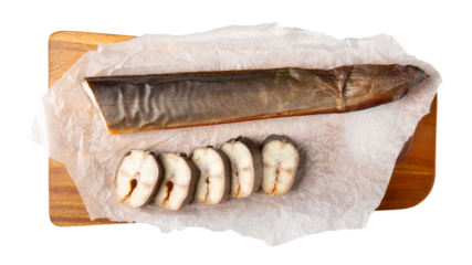 Smoked eel on wooden board isolated on white background. Fish delicacy ready to eat. Fish tail. Top view.