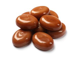 Tasty sweet caramel candies isolated on white