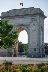 The famous triumphal arch monument in Bucharest, Romania, a popular European travel destination and...