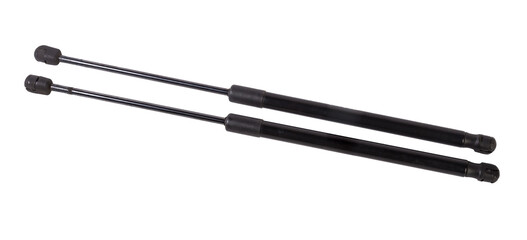A pair of black metal hood shock absorbers with chrome elements - detail of a car mechanism on a...