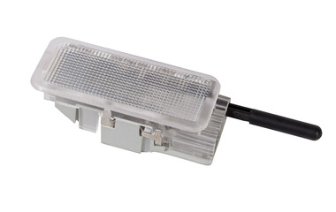 A  transparent plastic shade for illuminating the interior on a white isolated background in a photo studio - spare parts for repairing a car interior or for sale in a auto service.