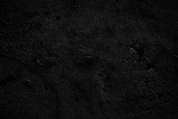 Black concrete wall texture background. Dark plaster wall texture.