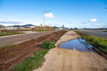 Suburban road in a newly built residential area in Wyndham Vale, Melbourne, Australia. Early stages...