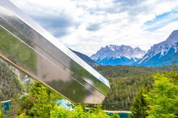 Binoculars at Zugspitze mountain alpine landscape in Alps Tyrol Austria.