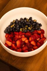 Fresh Berries A Colorful Bowl of Strawberries and Blueberries
