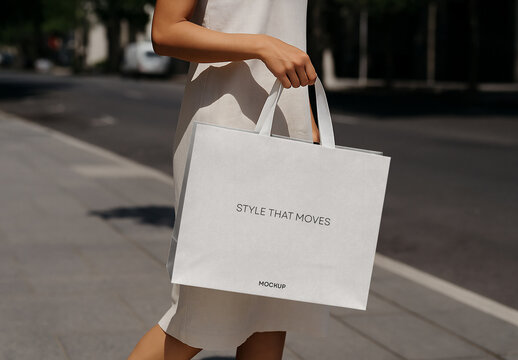 Minimal Shopping Bag Mockup &ndash; Elegant Street Scene with White Paper Tote for Fashion or Retail Branding