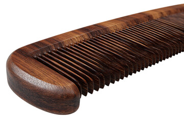 Close up of a finely crafted wooden comb with a smooth finish and distinct grain isolated on transparent background