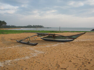 Caribbean beach with boat on the sand