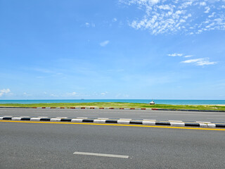 roadside at the beach with blue sky
