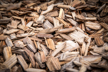 Close-Up of Natural Wooden Mulch Texture for Landscaping, Gardening, or Biofuel Concepts.